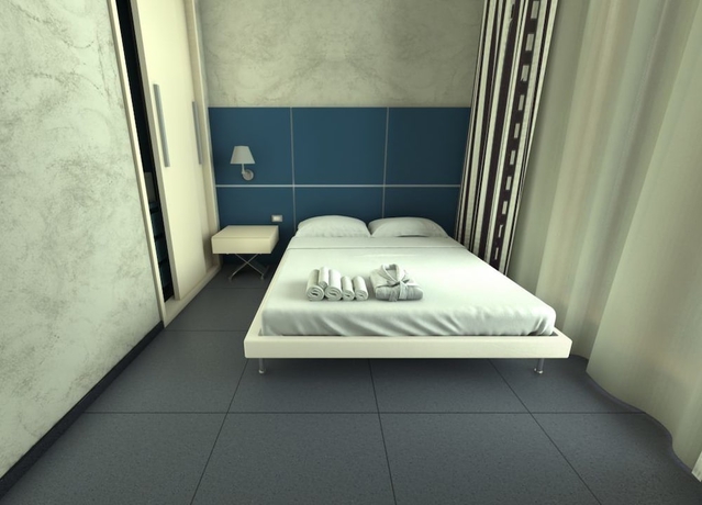 Imagen de la habitación del Hotel Home Club Suite. Foto 6