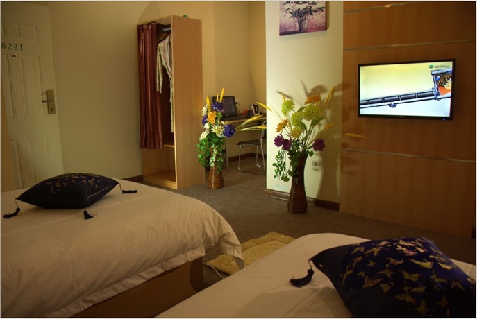 Imagen de la habitación del Hotel Home Club Yuexiu Branch. Foto 1