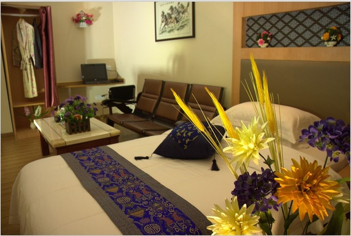 Imagen de la habitación del Hotel Home Club Yuexiu Branch. Foto 10