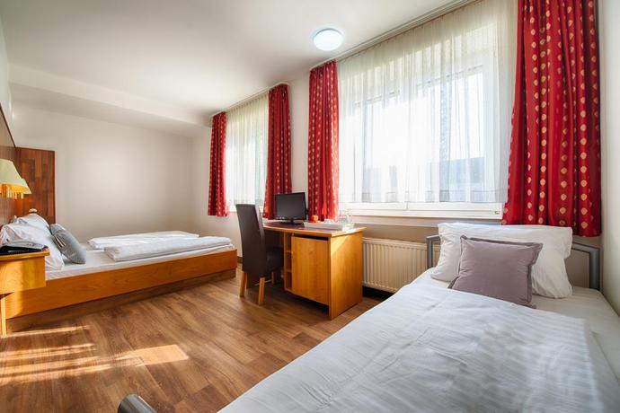 Imagen de la habitación del Hotel Home, Dortmund. Foto 3