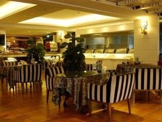 Imagen del bar/restaurante del Hotel Home Fond Luohu. Foto 4