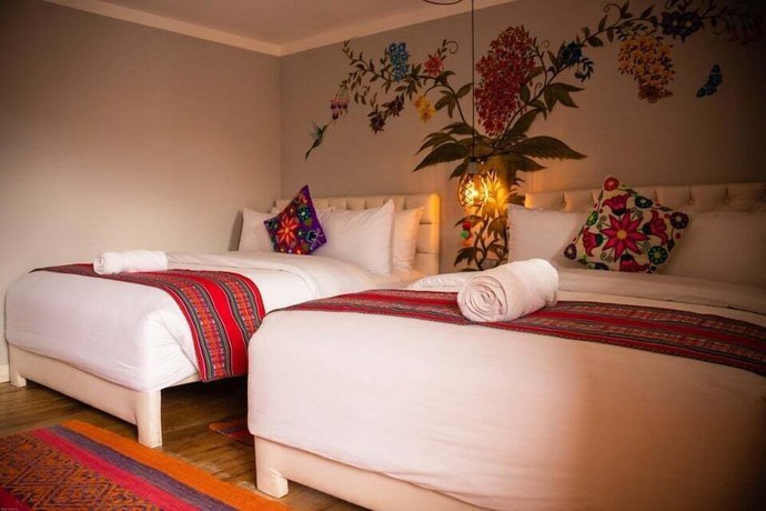 Imagen de la habitación del Hotel Home Garden. Foto 6