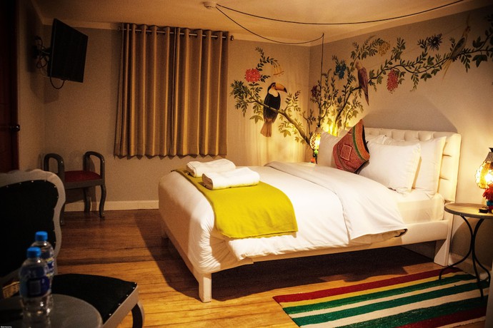 Imagen de la habitación del Hotel Home Garden. Foto 9