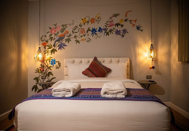 Imagen de la habitación del Hotel Home Garden. Foto 17