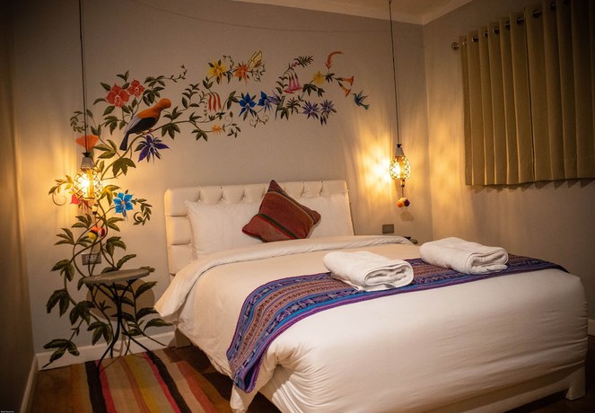 Imagen de la habitación del Hotel Home Garden. Foto 18