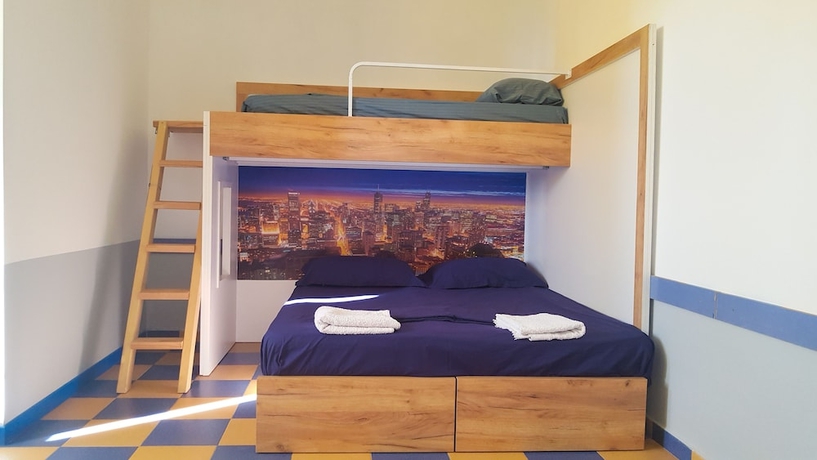 Imagen de la habitación del Hotel Home Hostel. Foto 12