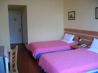 Imagen de la habitación del Hotel Home Inn Baliqiao. Foto 4