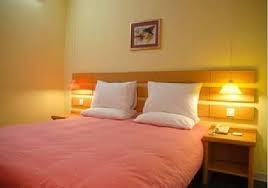 Imagen de la habitación del Hotel Home Inn Beixinqiao. Foto 3