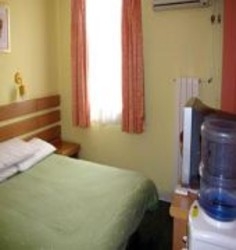 Imagen de la habitación del Hotel Home Inn Beixinqiao. Foto 4