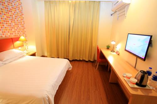 Imagen de la habitación del Hotel Home Inn Bengbu Huaihe Road Department Store. Foto 7