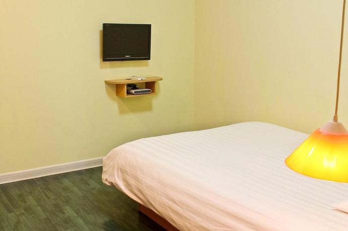 Imagen de la habitación del Hotel Home Inn Bus Station. Foto 3