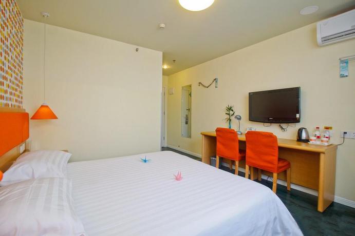 Imagen de la habitación del Hotel Home Inn Bus Station. Foto 8