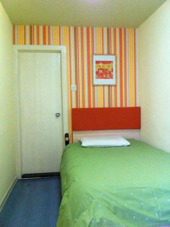 Imagen de la habitación del Hotel Home Inn Bus Station. Foto 9