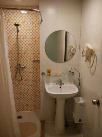 Imagen de la habitación del Hotel Home Inn Bus Station. Foto 10