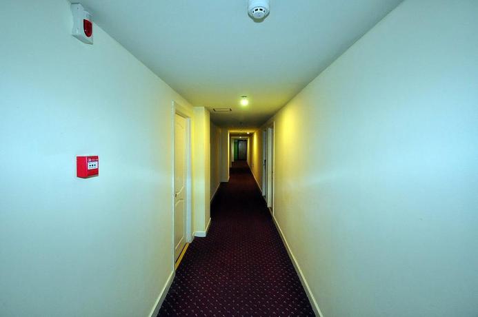 Imagen de los interiores del Hotel Home Inn Bus Station. Foto 15