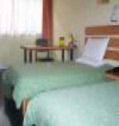 Imagen de la habitación del Hotel Home Inn Chaoyang Park. Foto 3