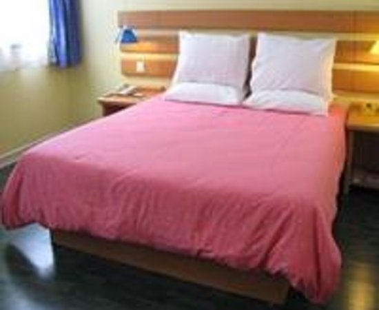 Imagen de la habitación del Hotel Home Inn Chaoyang Park. Foto 4