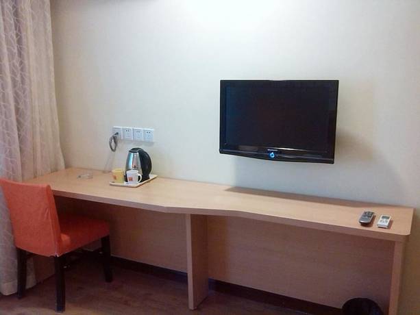 Imagen de la habitación del Hotel Home Inn (Chongqing Yangjiaping Light Rail Station, Pedestrian Street). Foto 3