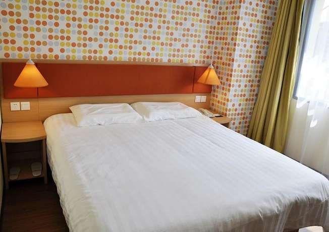 Imagen de la habitación del Hotel Home Inn (Chongqing Yangjiaping Light Rail Station, Pedestrian Street). Foto 5