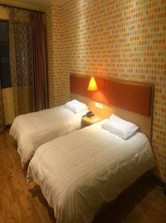 Imagen de la habitación del Hotel Home Inn (Chongqing Yangjiaping Light Rail Station, Pedestrian Street). Foto 16