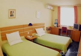 Imagen de la habitación del Hotel Home Inn Dongzhimen. Foto 2