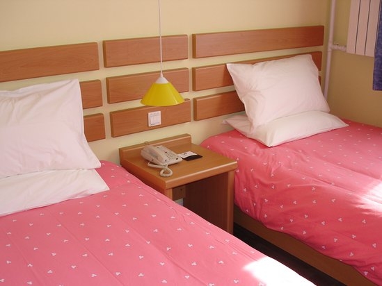 Imagen de la habitación del Hotel Home Inn Dongzhimen. Foto 3