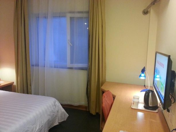 Imagen de la habitación del Hotel Home Inn. Foto 3