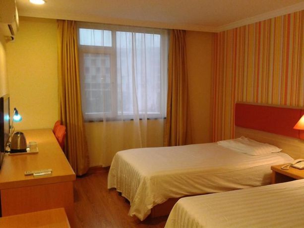 Imagen de la habitación del Hotel Home Inn. Foto 4