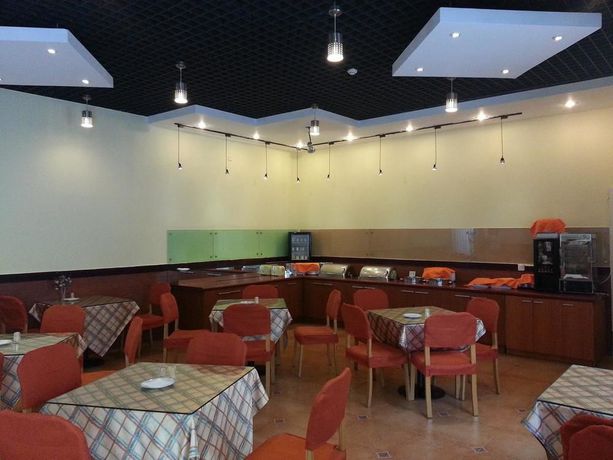 Imagen del bar/restaurante del Hotel Home Inn. Foto 2