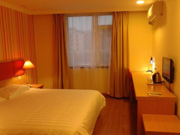 Imagen de la habitación del Hotel Home Inn. Foto 5