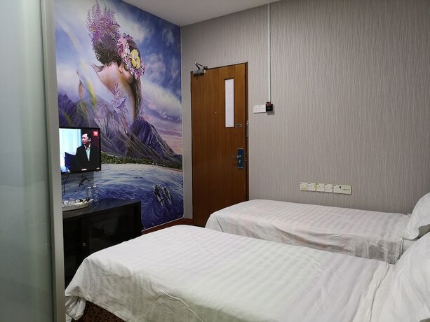 Imagen de la habitación del Hotel Home Inn. Foto 13