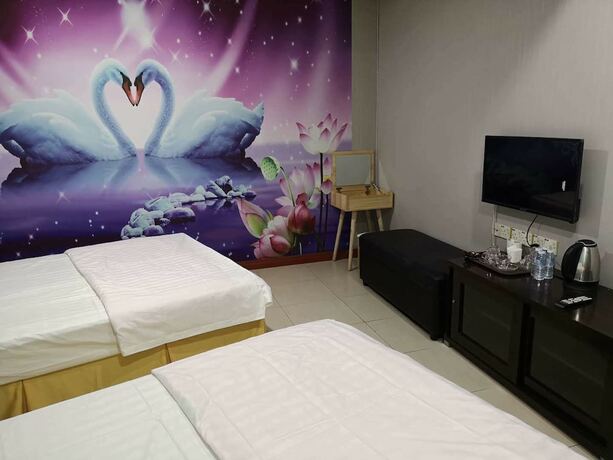 Imagen de la habitación del Hotel Home Inn. Foto 14