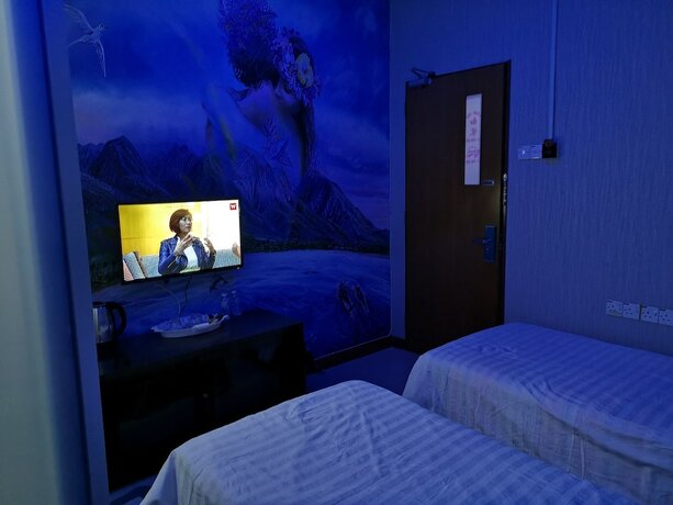 Imagen de la habitación del Hotel Home Inn. Foto 18