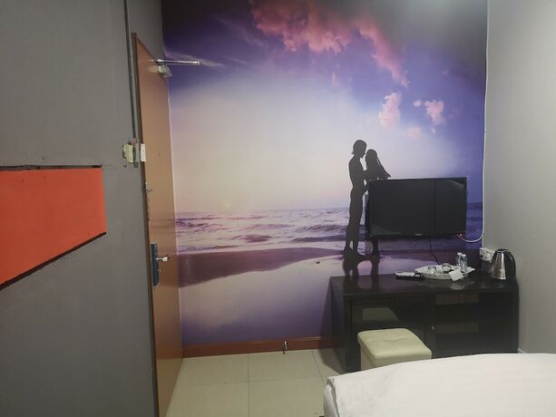 Imagen de la habitación del Hotel Home Inn. Foto 24