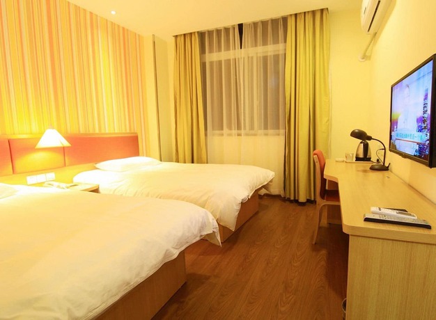 Imagen de la habitación del Hotel Home Inn Guiping Xishan Bus Center. Foto 13