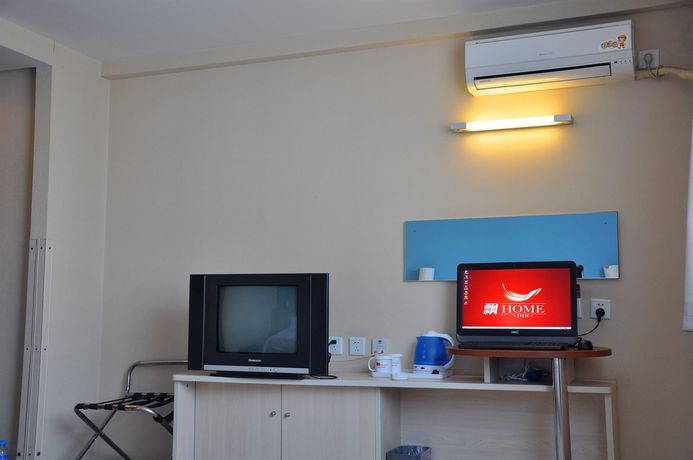 Imagen de la habitación del Hotel Home Inn Guomao. Foto 5