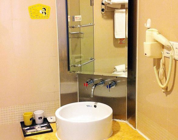 Imagen de la habitación del Hotel Home Inn Guomao. Foto 6
