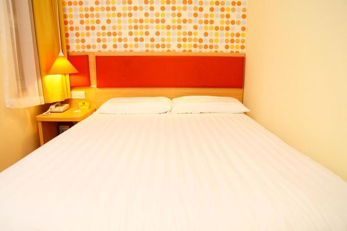 Imagen de la habitación del Hotel Home Inn Guomao. Foto 7