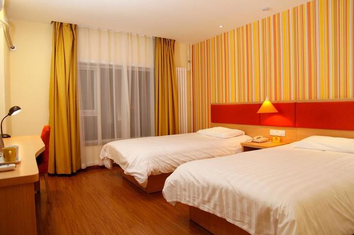 Imagen de la habitación del Hotel Home Inn Guomao. Foto 9