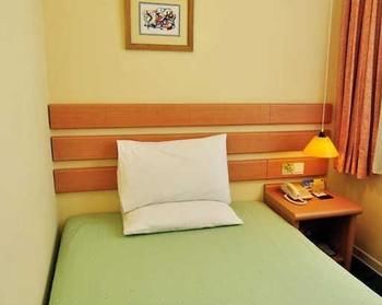 Imagen de la habitación del Hotel Home Inn Guomao. Foto 10