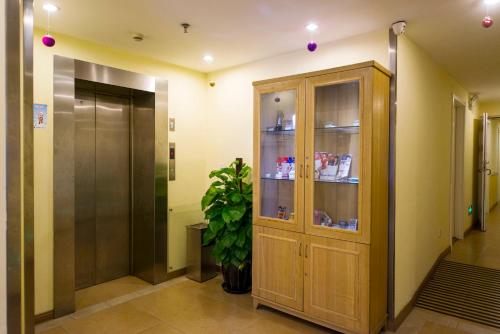 Imagen de la habitación del Hotel Home Inn Hangzhou Huanglong Yugu Road. Foto 8