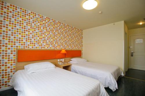 Imagen de la habitación del Hotel Home Inn Hefei Suzhou Road Sun City. Foto 7