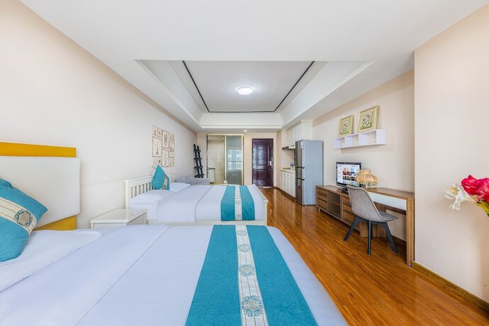 Imagen general del Hotel Home Inn Huayi Apartment. Foto 3