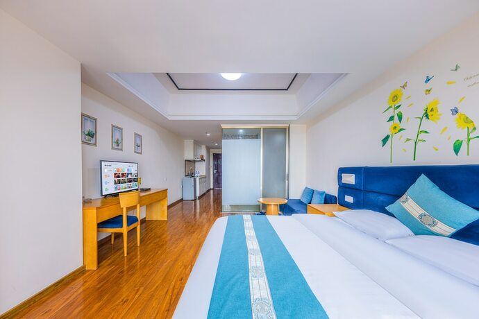 Imagen general del Hotel Home Inn Huayi Apartment. Foto 7