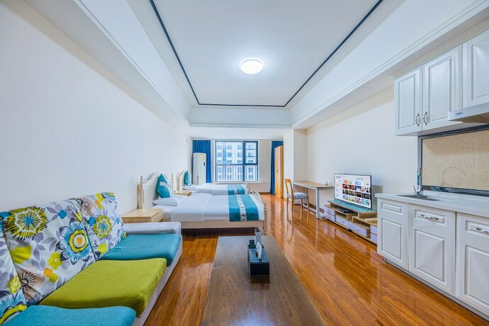 Imagen de la habitación del Hotel Home Inn Huayi Apartment. Foto 20