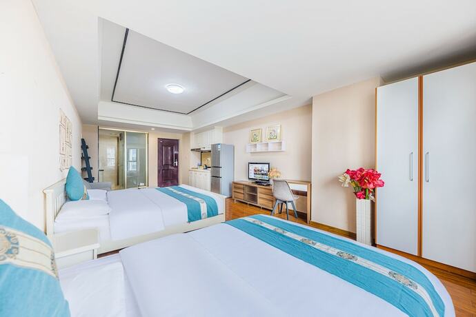 Imagen general del Hotel Home Inn Huayi Apartment. Foto 10