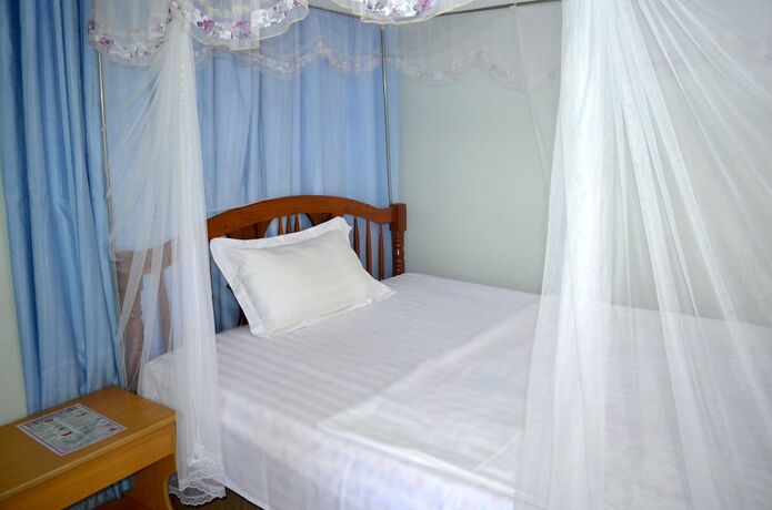 Imagen de la habitación del Hotel Home Inn, Kampala. Foto 15
