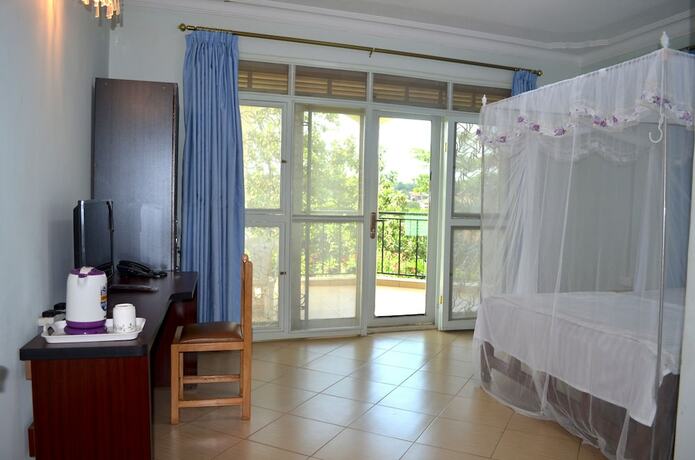 Imagen de la habitación del Hotel Home Inn, Kampala. Foto 17