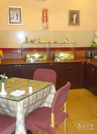 Imagen del bar/restaurante del Hotel Home Inn Lian Ban. Foto 2