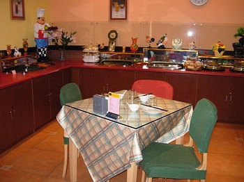Imagen del bar/restaurante del Hotel Home Inn Mudianyuan. Foto 2